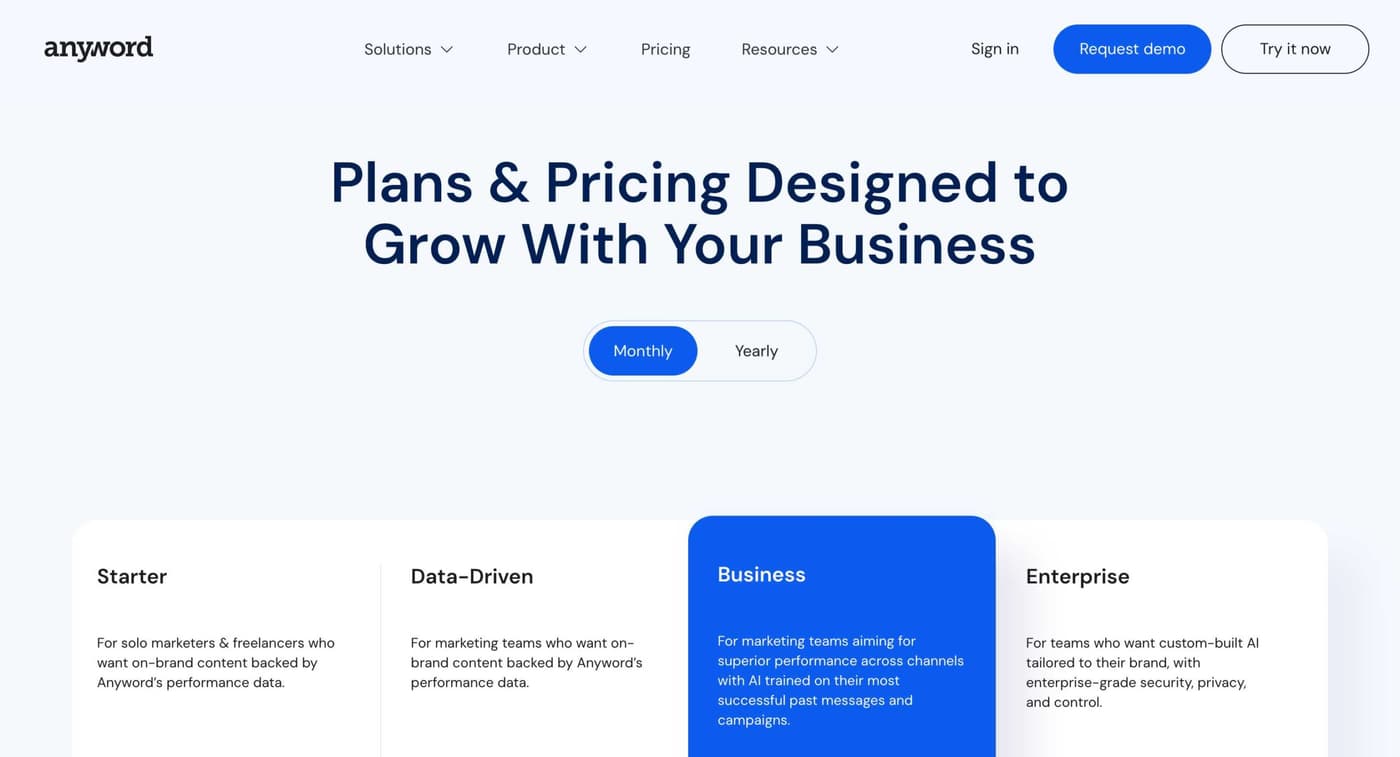 Anyword pricing page displaying Starter, Data-Driven, Business, and Enterprise plans with feature comparisons