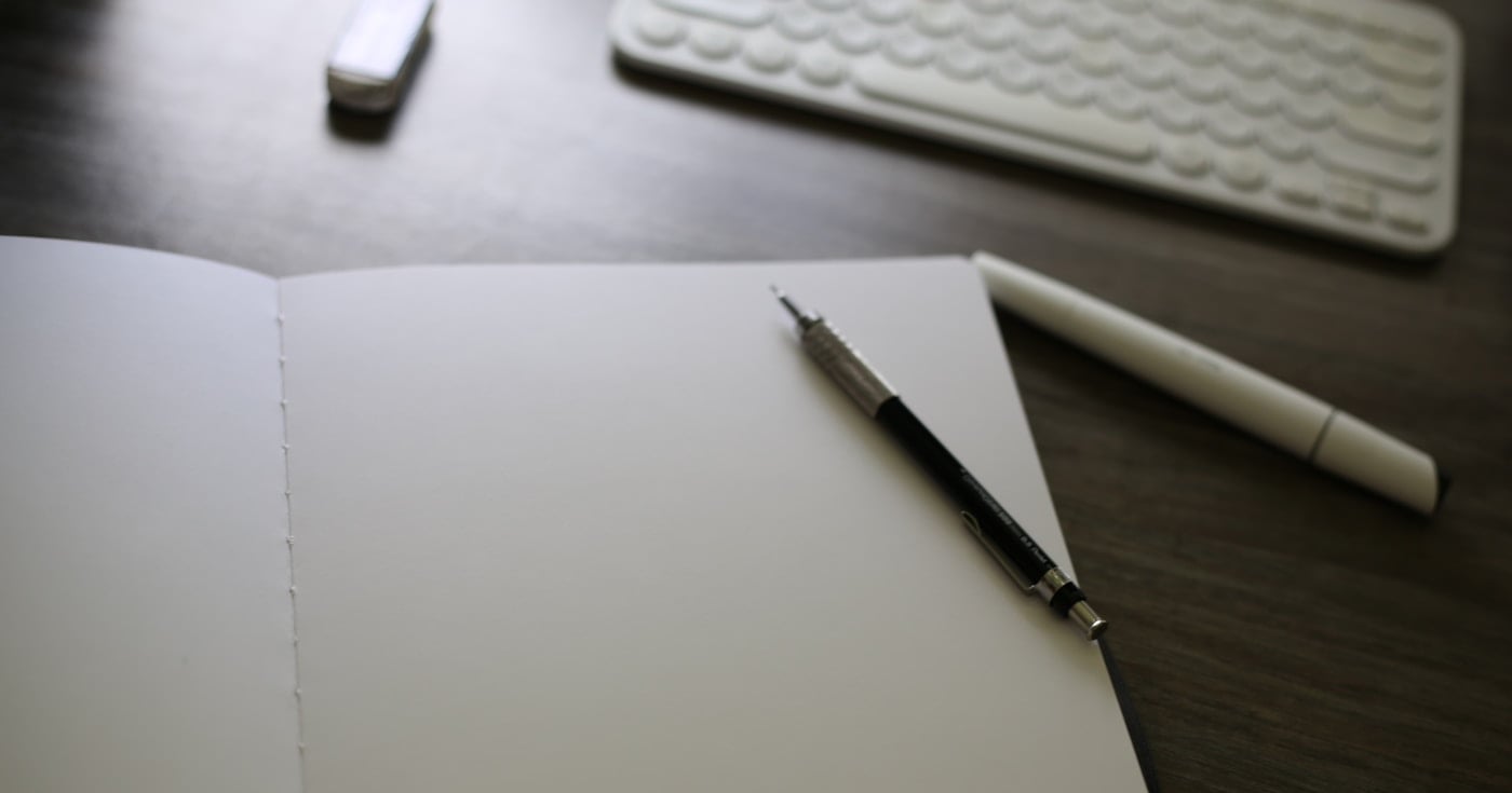Open notebook on desk — common grammar mistakes