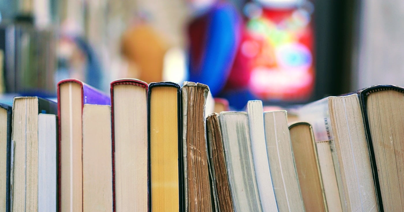 Stack of books at an open-air book market