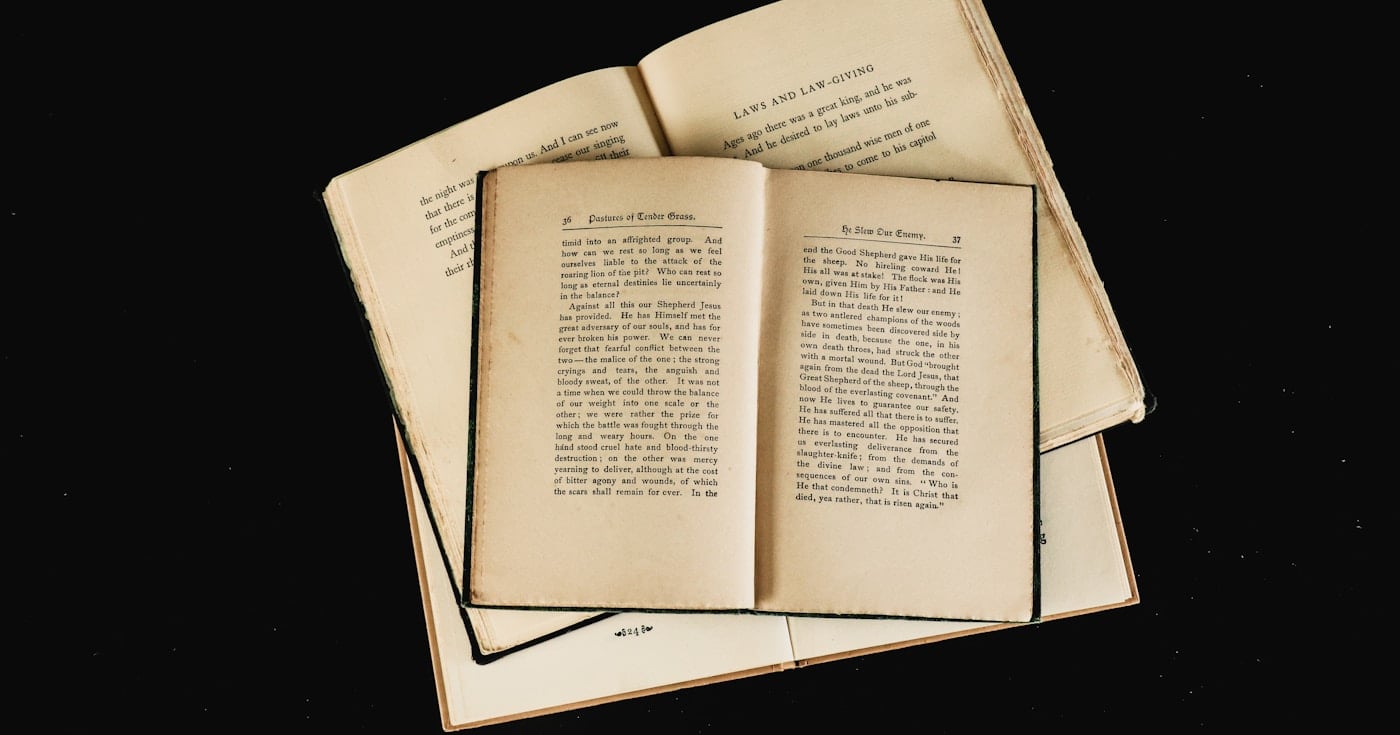 Open books representing parallelism in writing