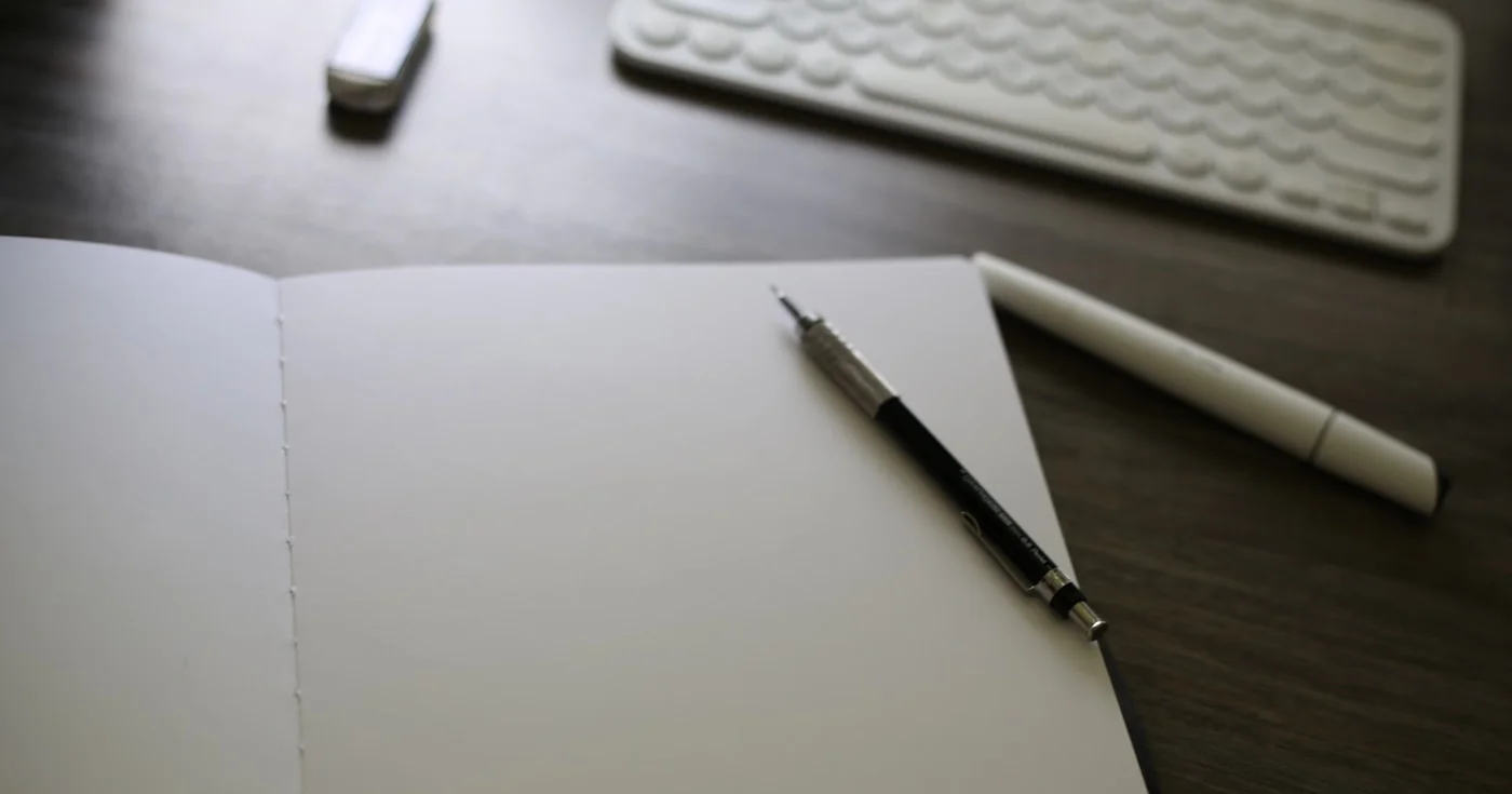 Open notebook on desk — common grammar mistakes
