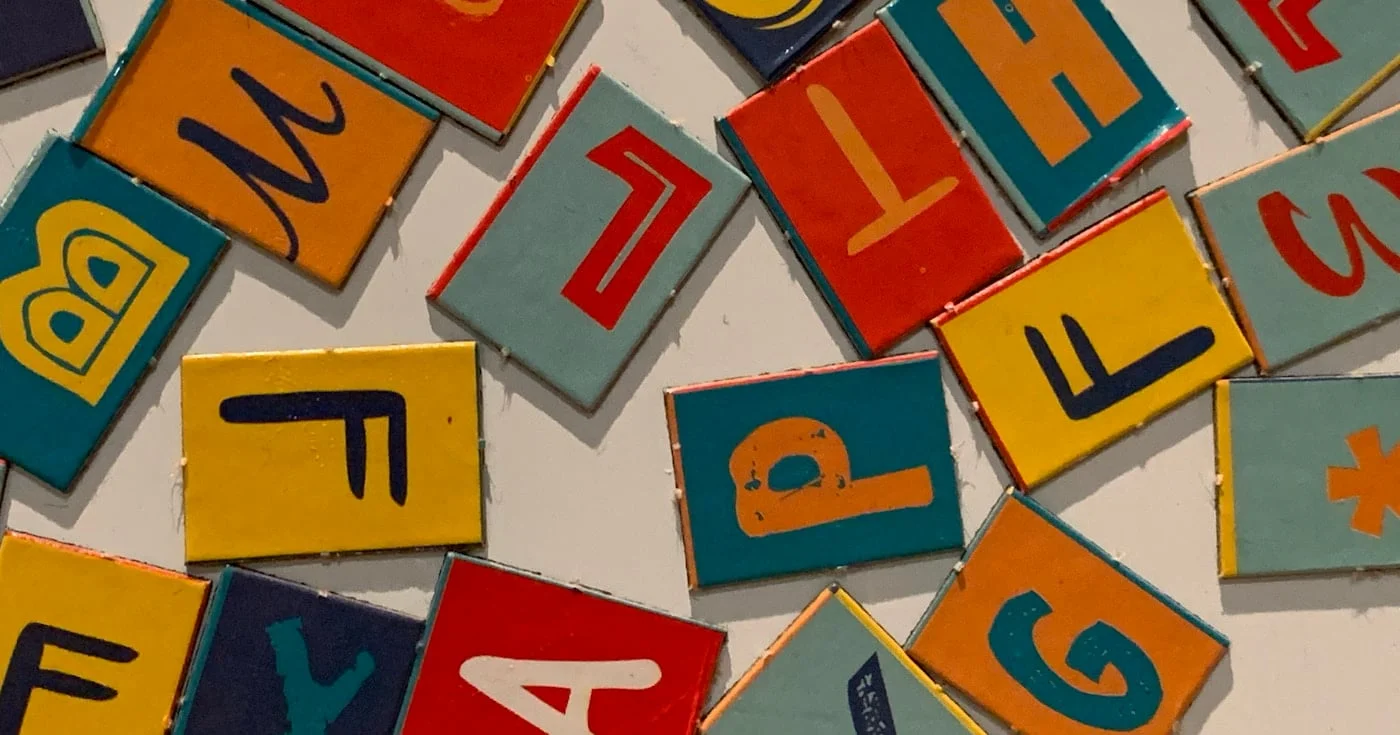 Jumbled letters representing alliteration and the sound patterns in writing
